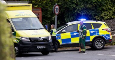 Emergency responders at a bus crash scene.