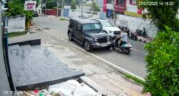 Security camera footage of a car hitting a scooter.