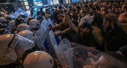 Protesters clashing with riot police in Istanbul.