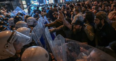 Protesters clashing with riot police in Istanbul.