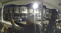 Security camera footage of a nighttime shooting.