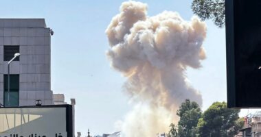 Smoke billows following Israeli strikes in Damascus.