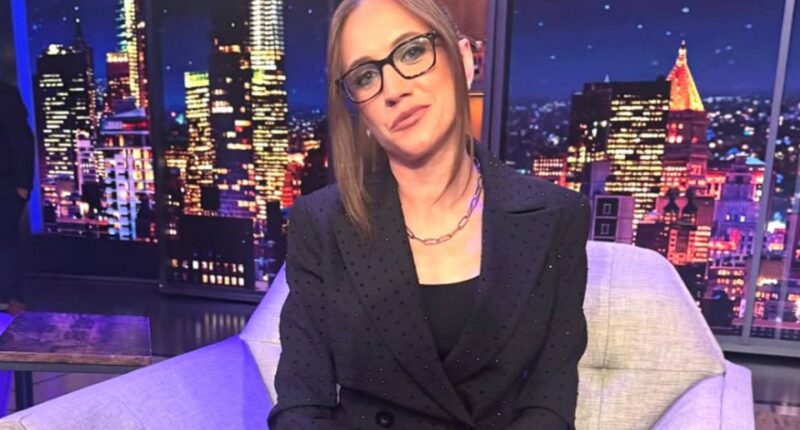 Kat Timpf on a talk show set.
