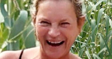 Kate Moss, 51, guffaws during Ibiza beach trip with daughter Lila, 22