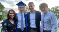 Family photo at a graduation ceremony.