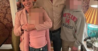 Photo of Kristin and Andrew Cabot with their children.