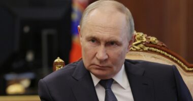 Vladimir Putin in a meeting.