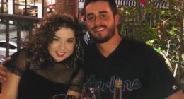 Naibel Benavides and Dillon Angulo at a restaurant.