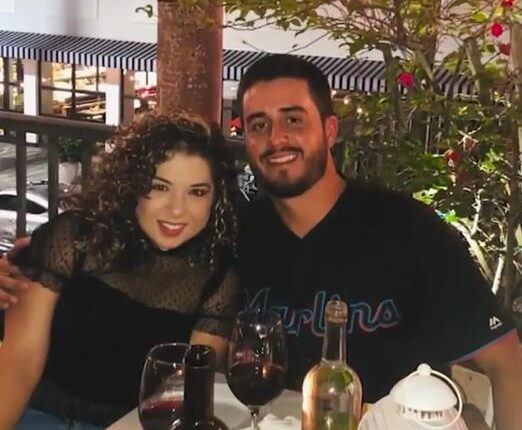 Naibel Benavides and Dillon Angulo at a restaurant.
