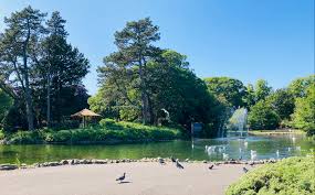 Grimsby park scene with pond and fountain.