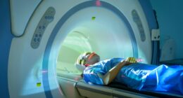 Woman undergoing an MRI scan.