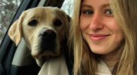 Eliotte Heinz and her dog in a car.