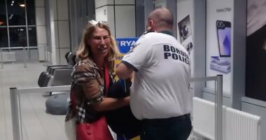 Moment Ryanair passenger SOBS after being stopped from boarding plane