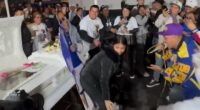 A widow twerking at her husband's funeral.