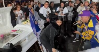 A widow twerking at her husband's funeral.