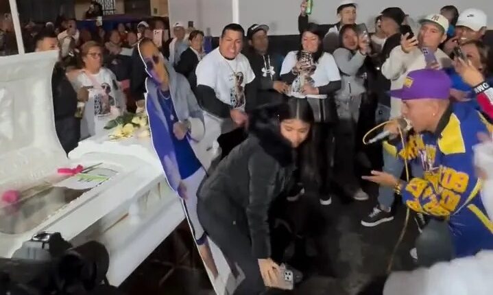 A widow twerking at her husband's funeral.