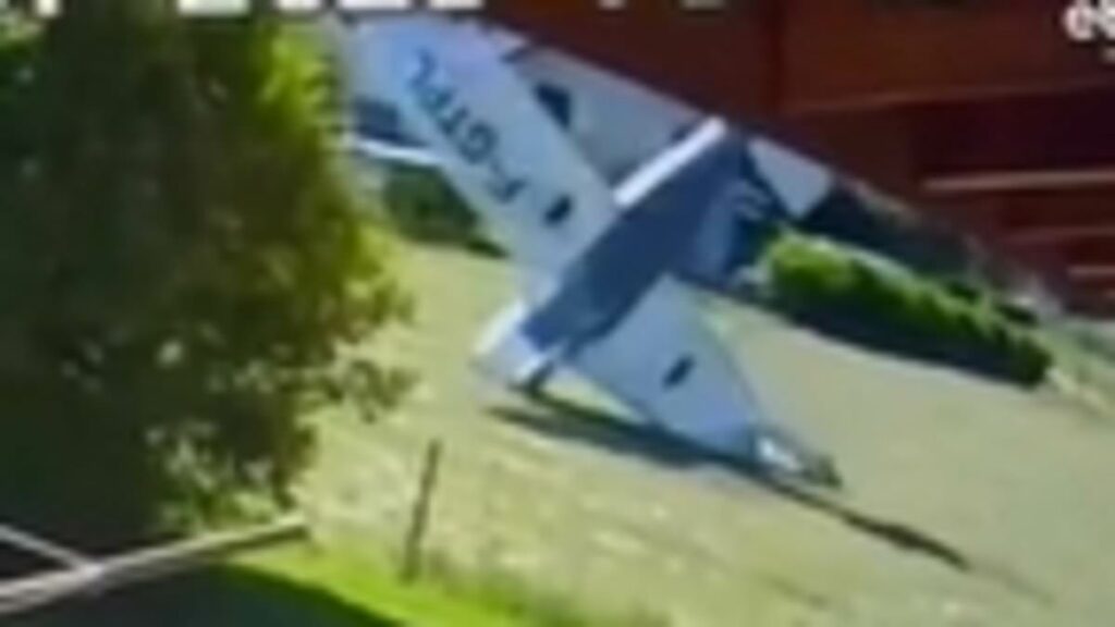 Moment tourist plane crashes yards from houses killing three