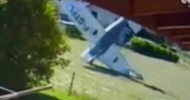 Moment tourist plane crashes yards from houses killing three