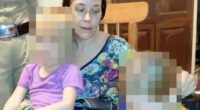 A Russian woman and her two young daughters, faces blurred for privacy, found living in a cave.