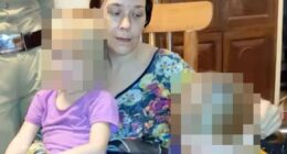A Russian woman and her two young daughters, faces blurred for privacy, found living in a cave.