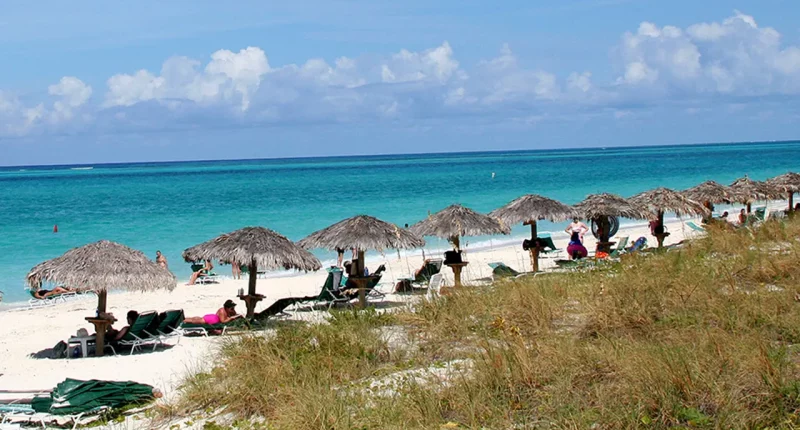 Mystery deepens as body discovered during search for missing American in island paradise