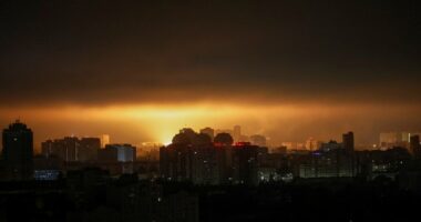 Drone explosion lights up Kyiv night sky.