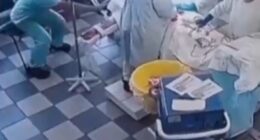 Surgeons performing surgery during an earthquake.