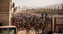 U.S. Marines assisting with evacuations at Hamid Karzai International Airport in Kabul.