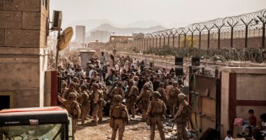 U.S. Marines assisting with evacuations at Hamid Karzai International Airport in Kabul.