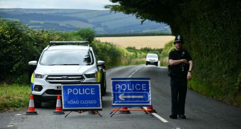 Emergency services respond as several people are in hospital after a school bus crash along A396 in Somerset. Emergency services at Wheddon Cross