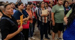 Outraged mob of grieving families demand answers over 400 corpses