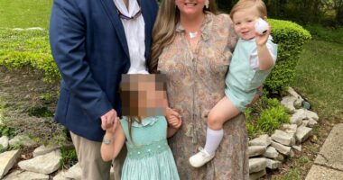 Family photo of John and Julia Burgess with their two children.