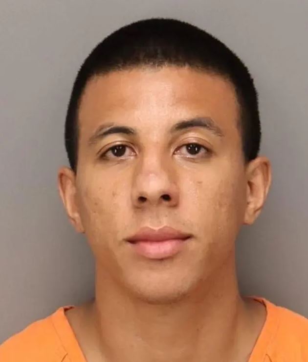 Mugshot of Taj Taylor, 27, arrested for claiming his laptop was a bomb.