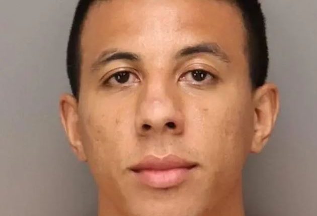 Mugshot of Taj Taylor, 27, arrested for claiming his laptop was a bomb.