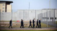 Prisoner escapes by hiding inside fellow inmate