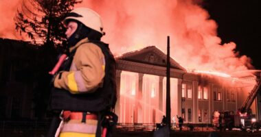 Firefighters battling a fire at a building in Kharkiv, Ukraine.