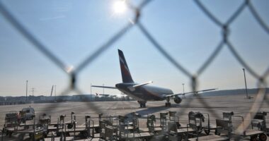 Aeroflot Airbus A321-211 parked at an airport.