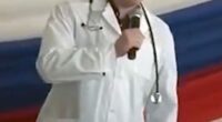 Ilya Sorokin, a Russian prison doctor accused of torturing Ukrainian prisoners of war, speaking into a microphone.