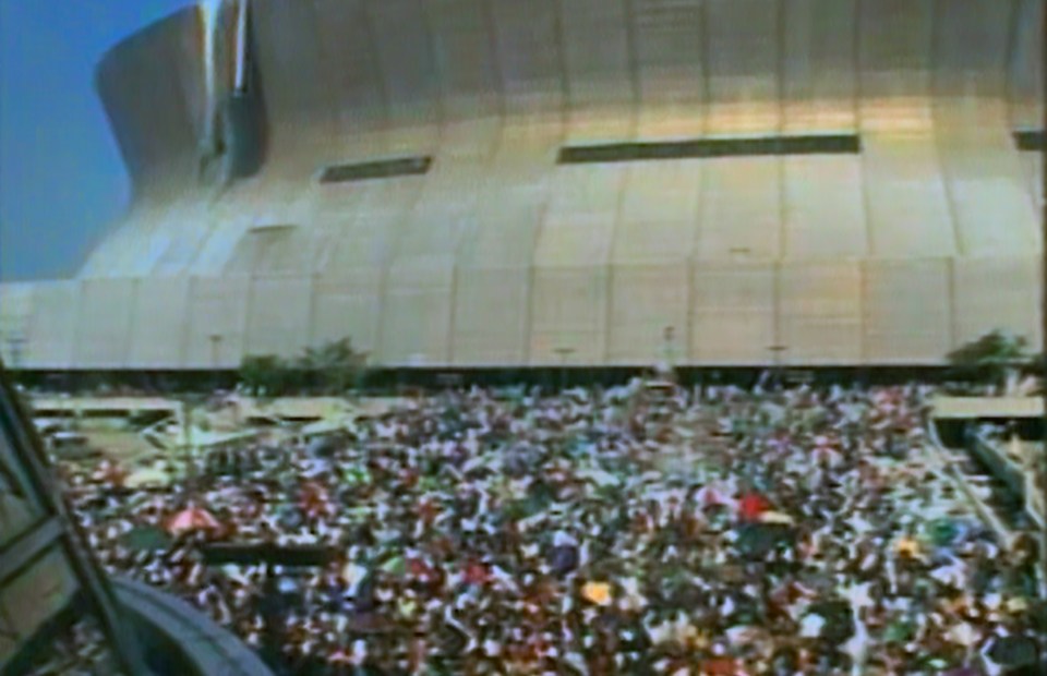 Stranded New Orleans residents gathered outside the Superdome after Hurricane Katrina.