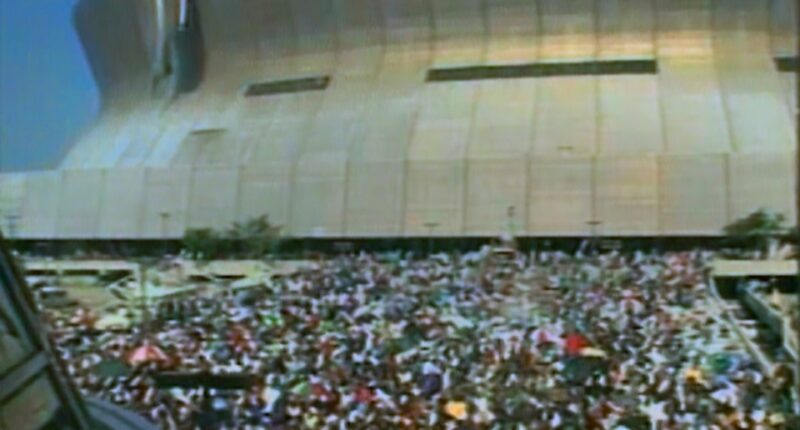 Stranded New Orleans residents gathered outside the Superdome after Hurricane Katrina.
