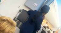 Scary moment plane passenger tries to open cabin doors at 30,000 feet
