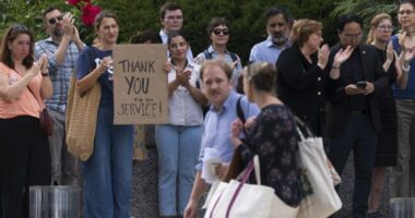 Senate Democrats join fired State Department employees to rally against layoffs
