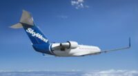 SkyWest flight diverted after passenger tries to open emergency door, fights with flight attendant: report