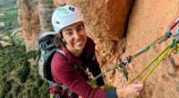 Woman rock climbing.