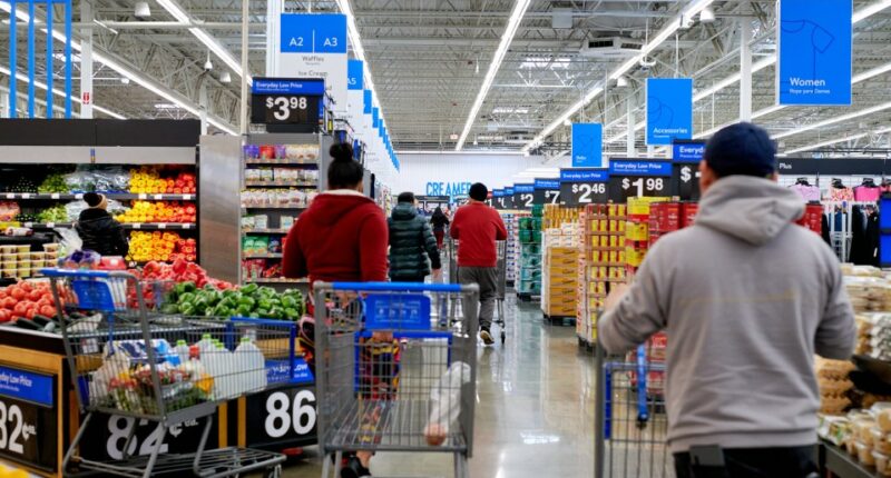 Shoppers in a Walmart store.