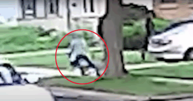 Surveillance footage of a child being kidnapped.