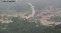Time-lapse of the Llano River in Texas rapidly flooding a road.