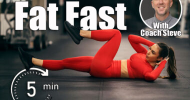 A fit sportswoman is doing bicycle crunches on a gym floor. This 3-Move Ab Combo Shrinks