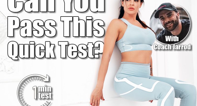 Fitness woman in blue sports clothing. Sexy young beautiful model with perfect body wearing sportswear. Female making exercises at home in white interior. Doing plank wall sit exercise. This Simple Test Can Reveal How Fit You Really Are (No Equipment Needed). Cover