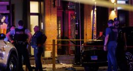 Police officers at a Chicago crime scene.